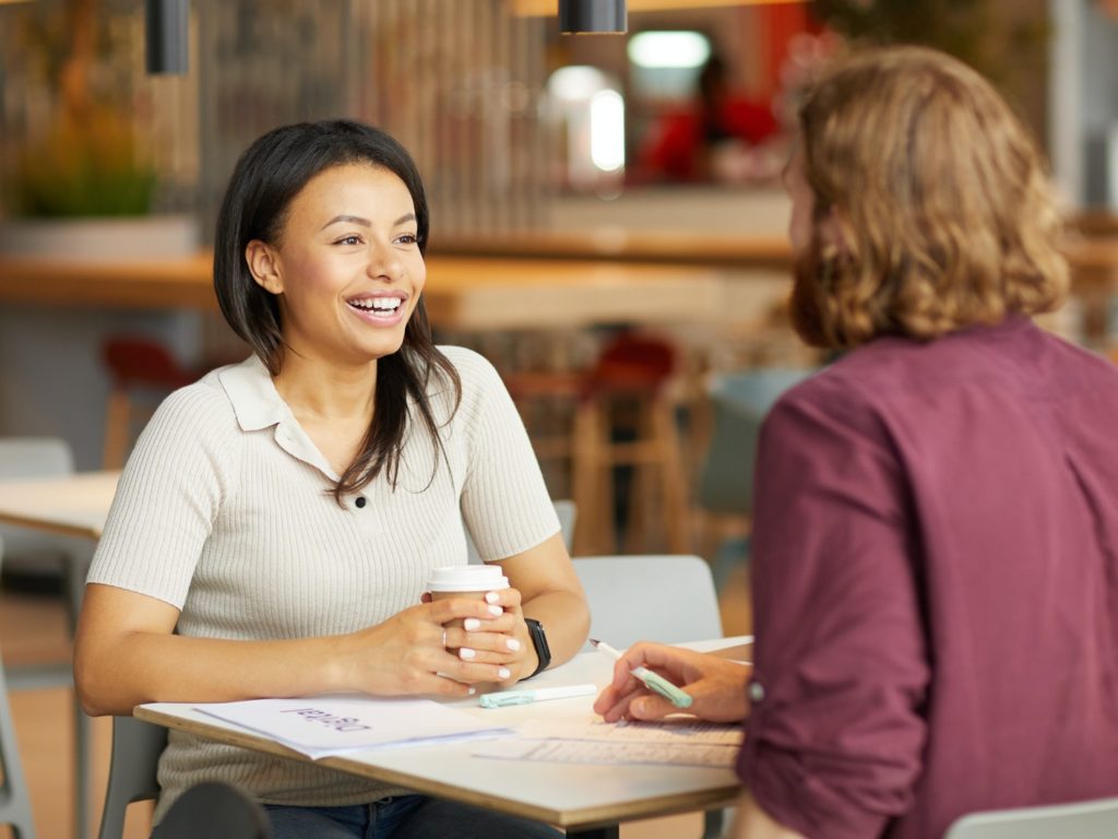 Woman has a meeting in cafe